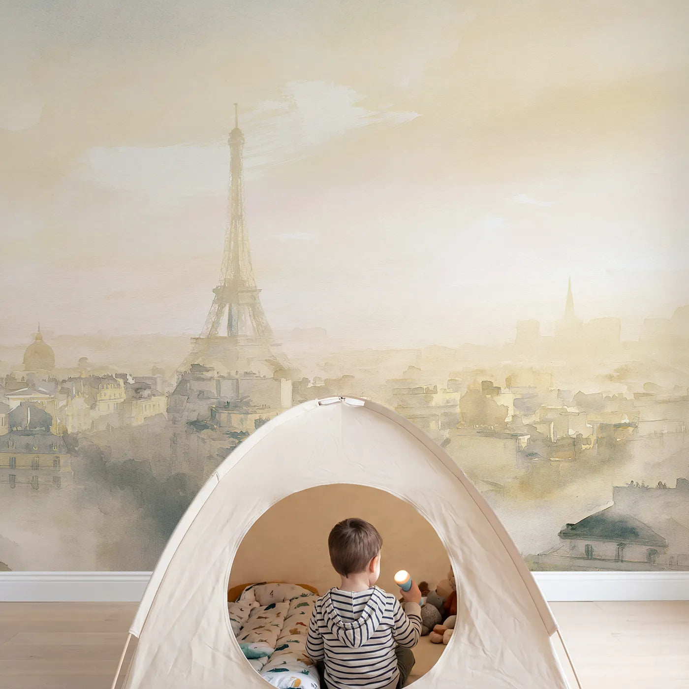 Child in nursery with Misty Eiffel Skyline Wallpaper Mural by Whimsy Tots