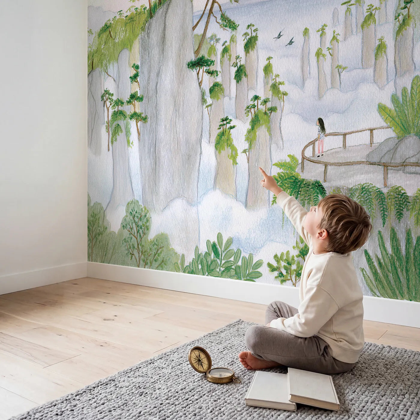 Child in nursery with The Misty Stone Pillars Wallpaper Mural by Whimsy Tots