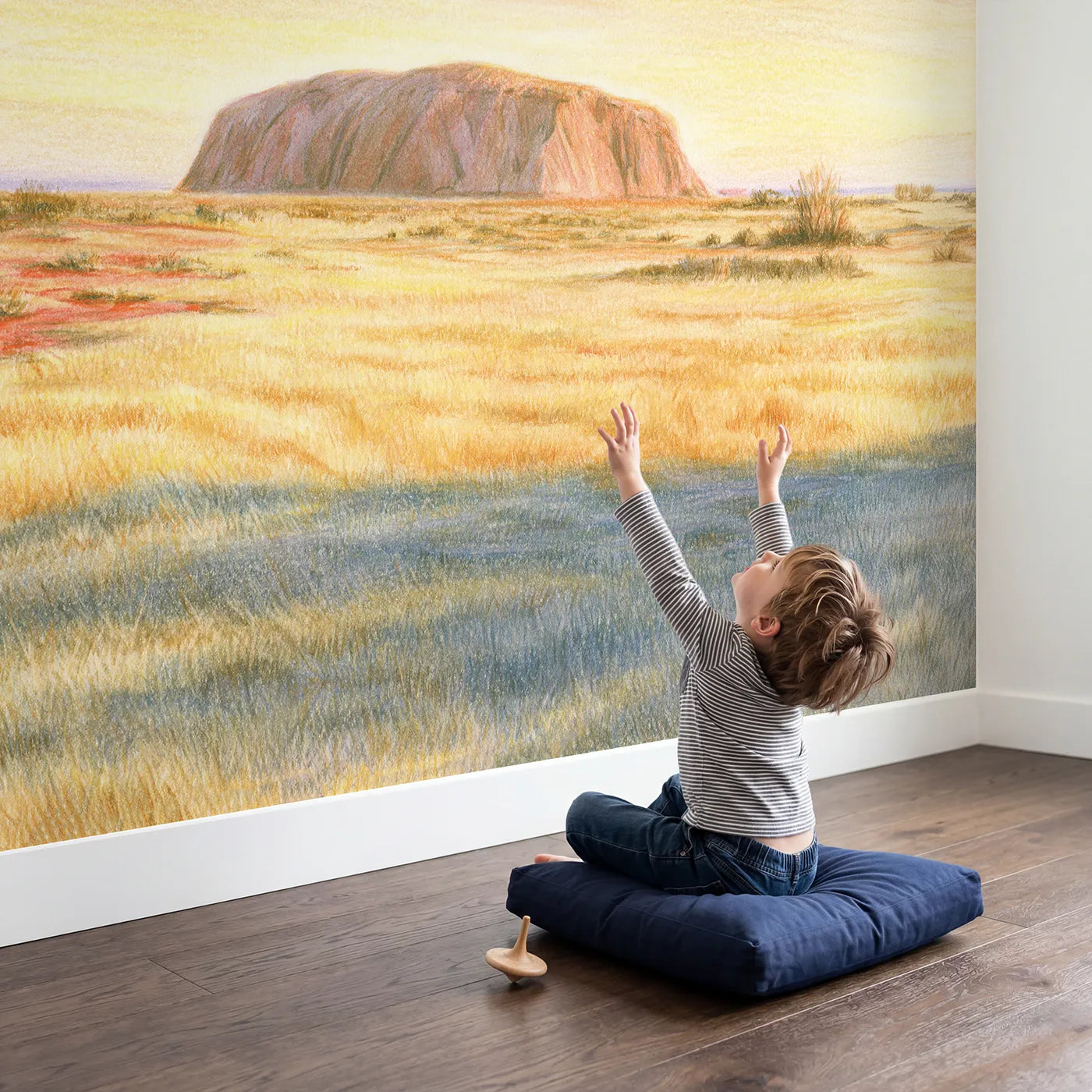 Child in nursery with Uluru Rock Wallpaper Mural by Whimsy Tots