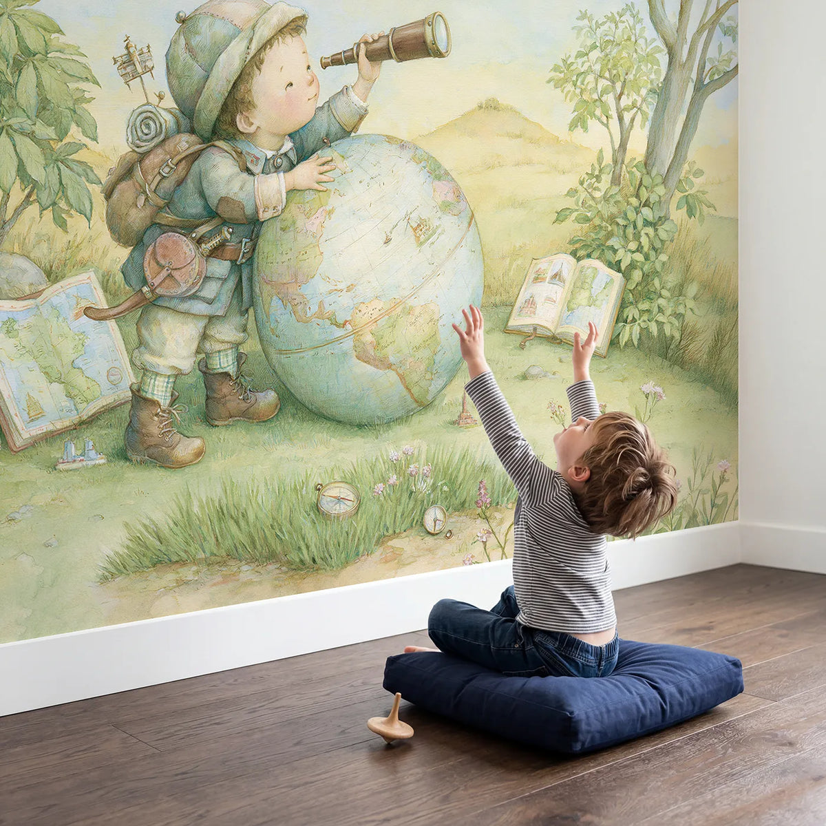 Child in nursery with Little World Explorer Wallpaper Mural by Whimsy Tots