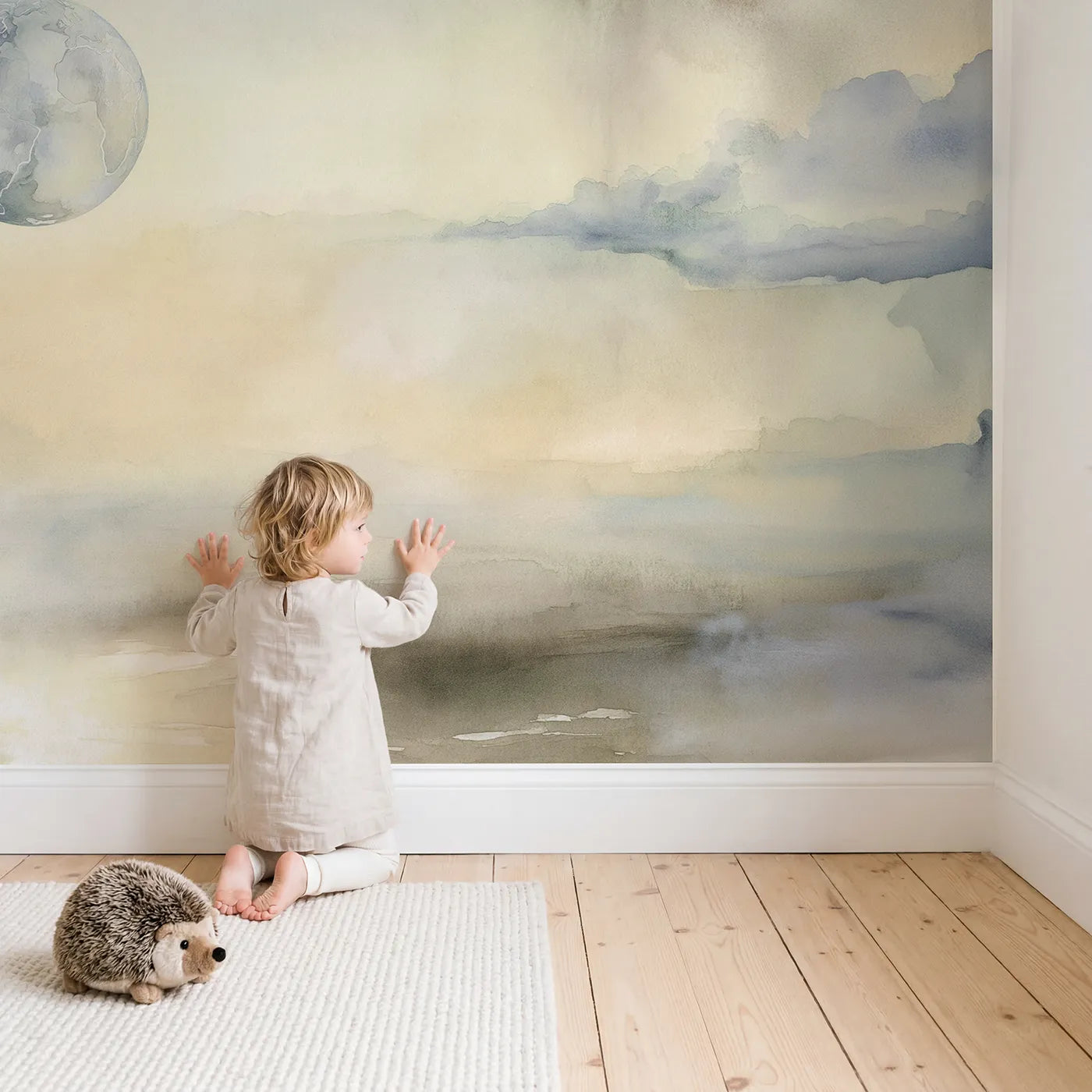 Child in nursery with Soft Globe Dream Wallpaper Mural by Whimsy Tots