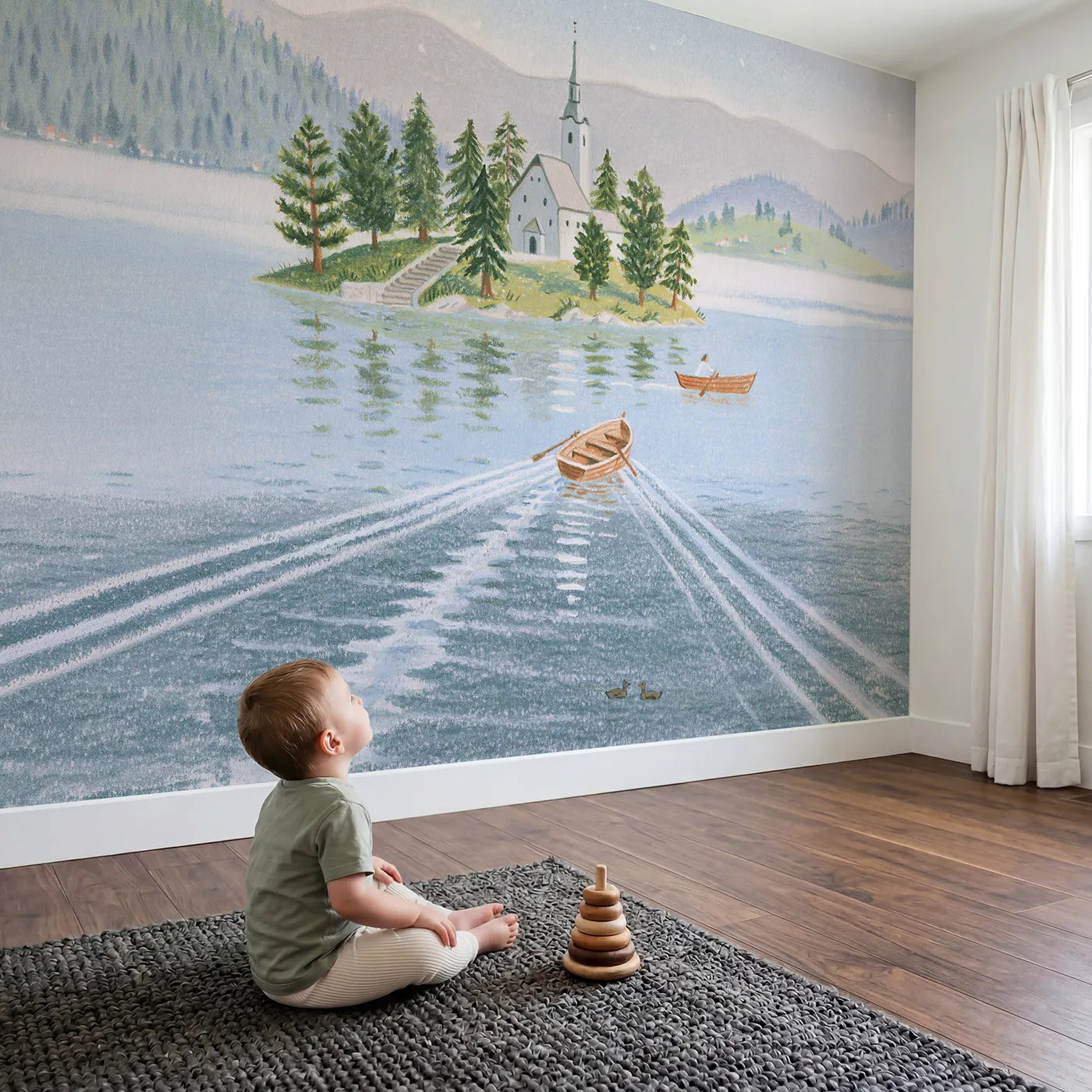 Child in nursery with The Island Church of Bled Wallpaper Mural by Whimsy Tots