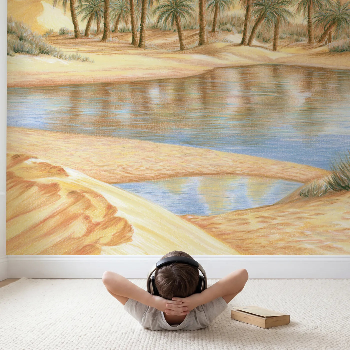 Child in nursery with Quiet Desert Oasis Wallpaper Mural by Whimsy Tots