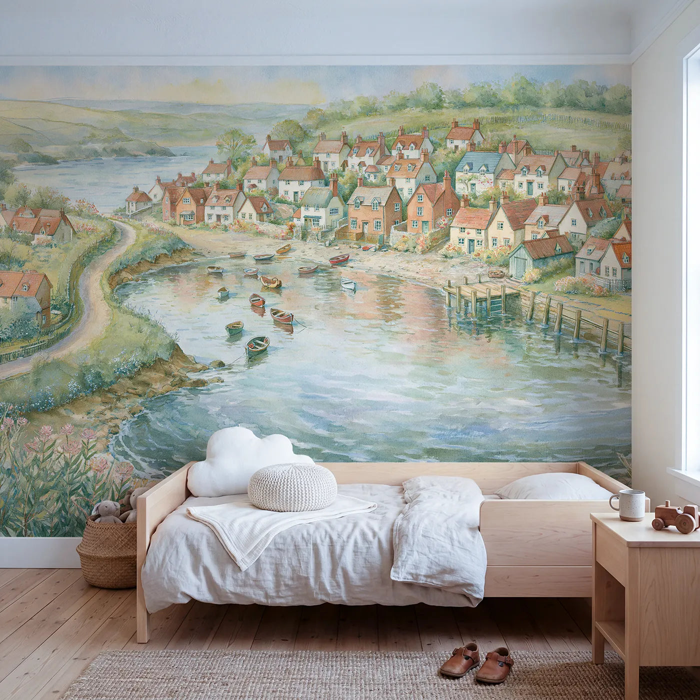 Storybook wall mural of a cozy coastal village by Whimsy Tots