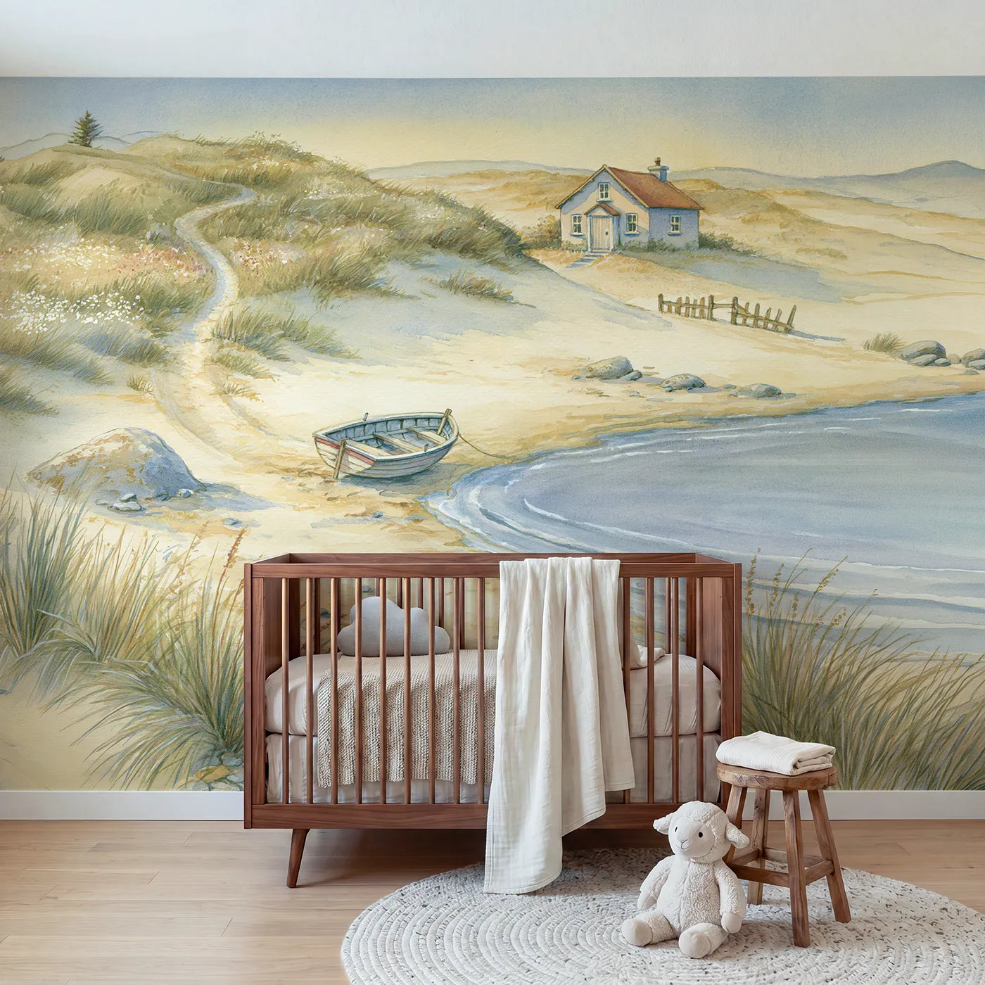 Storybook wall mural of a seaside cottage and rowboat by Whimsy Tots