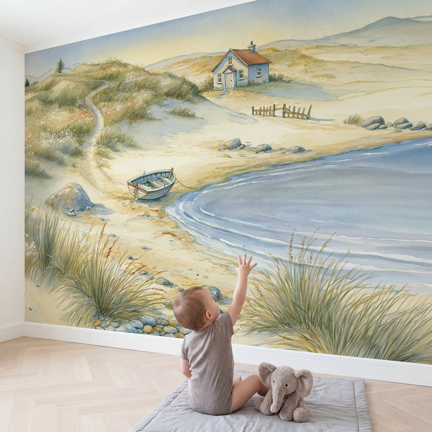 Child in nursery with Seaside Cottage Day Wallpaper Mural by Whimsy Tots