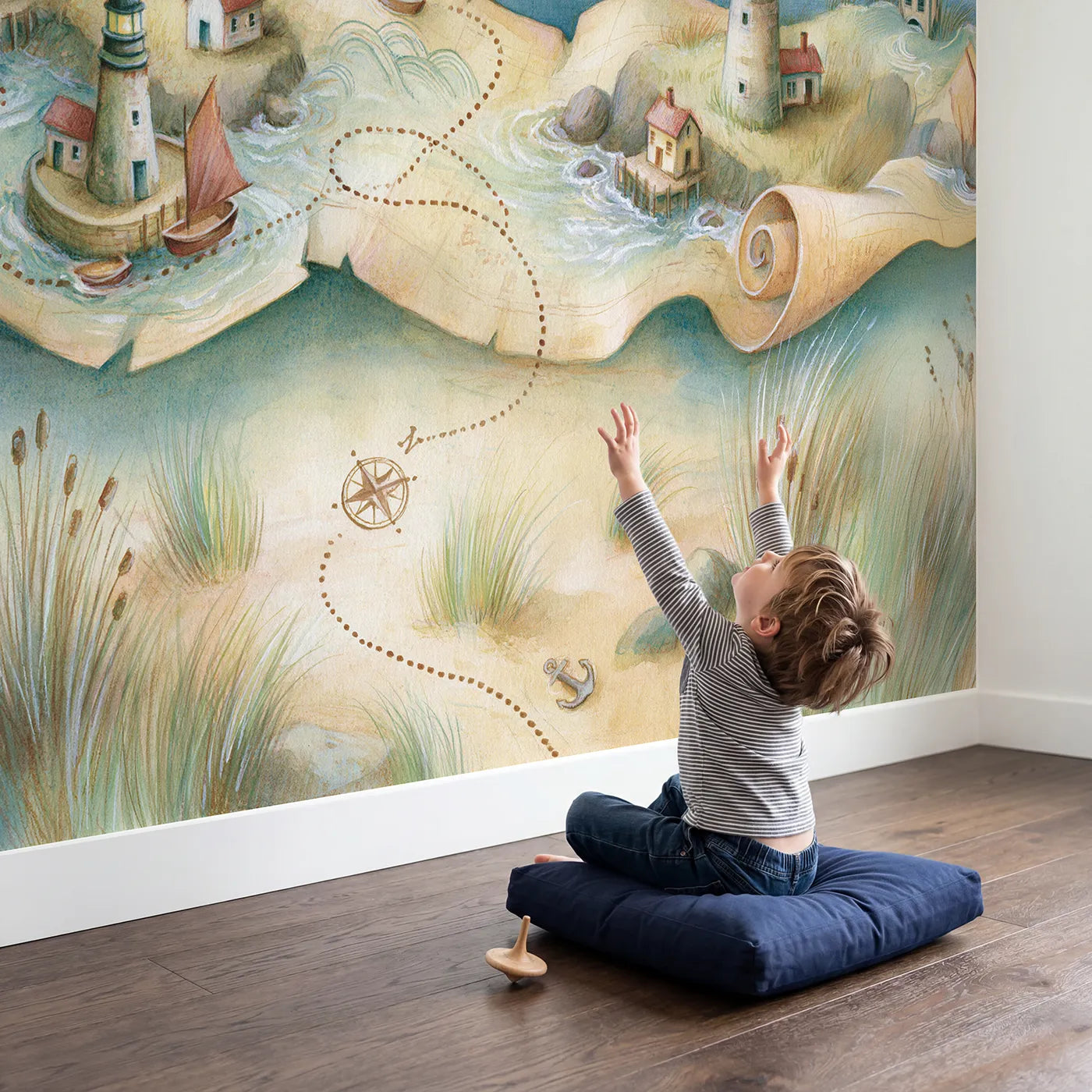 Child in nursery with Sea Voyage Map Wallpaper Mural by Whimsy Tots