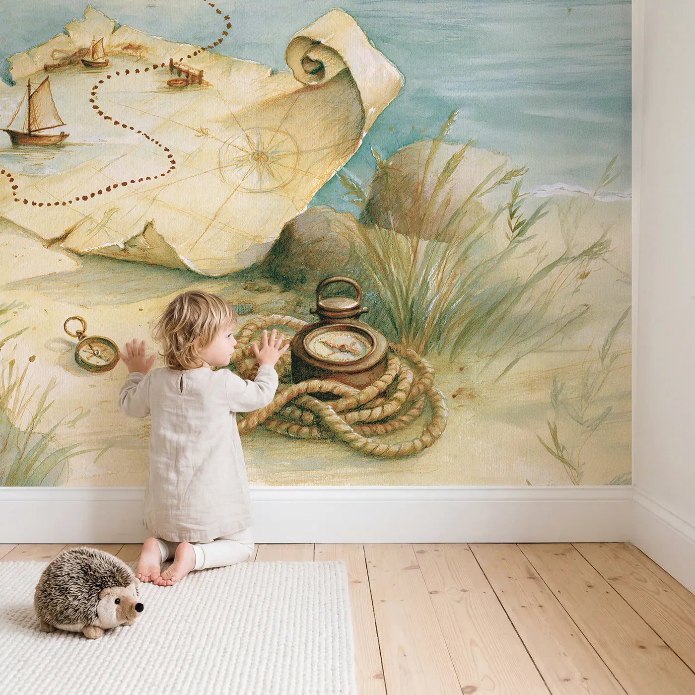 Child in nursery with Harbor Adventure Map Wallpaper Mural by Whimsy Tots