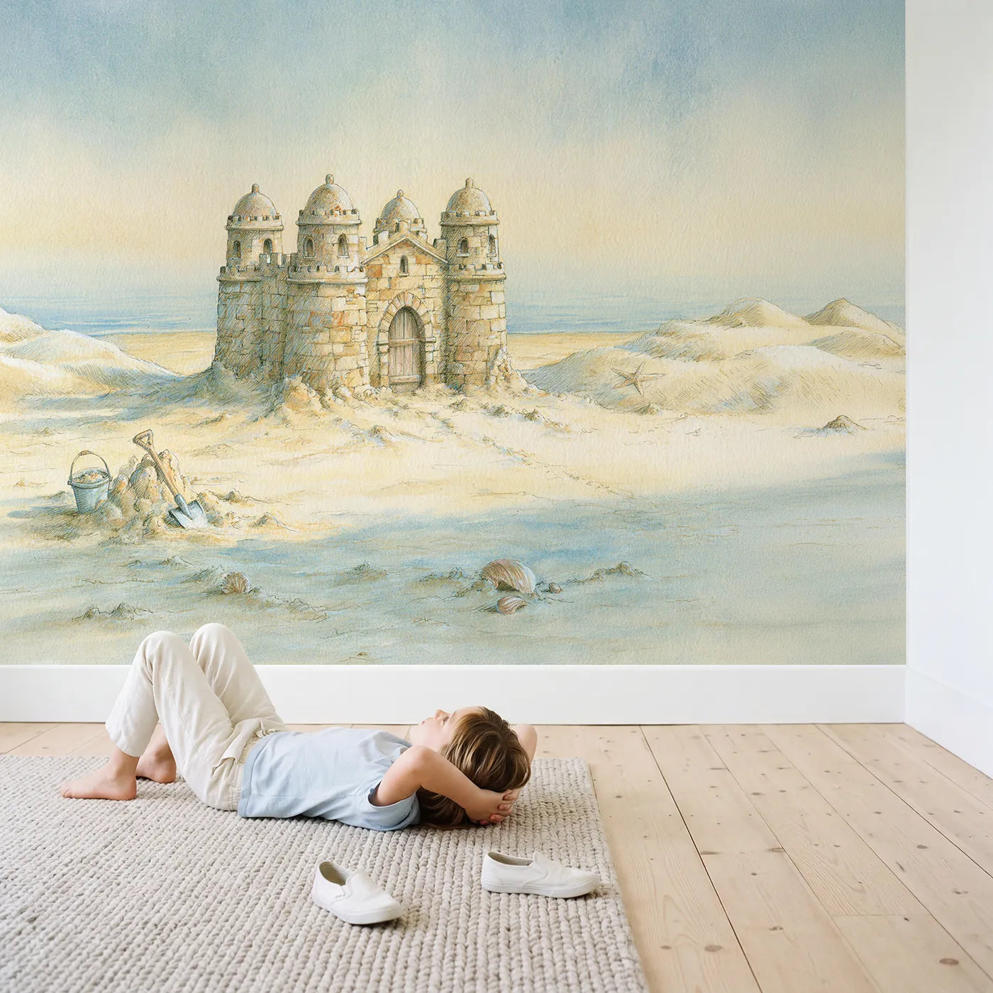 Child in nursery with Little Sandcastle Wallpaper Mural by Whimsy Tots