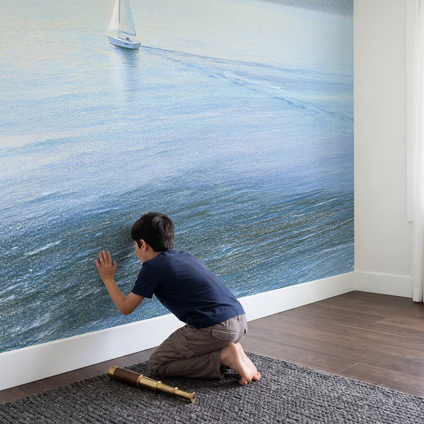 Child in nursery with Little White Sailboat Wallpaper Mural by Whimsy Tots