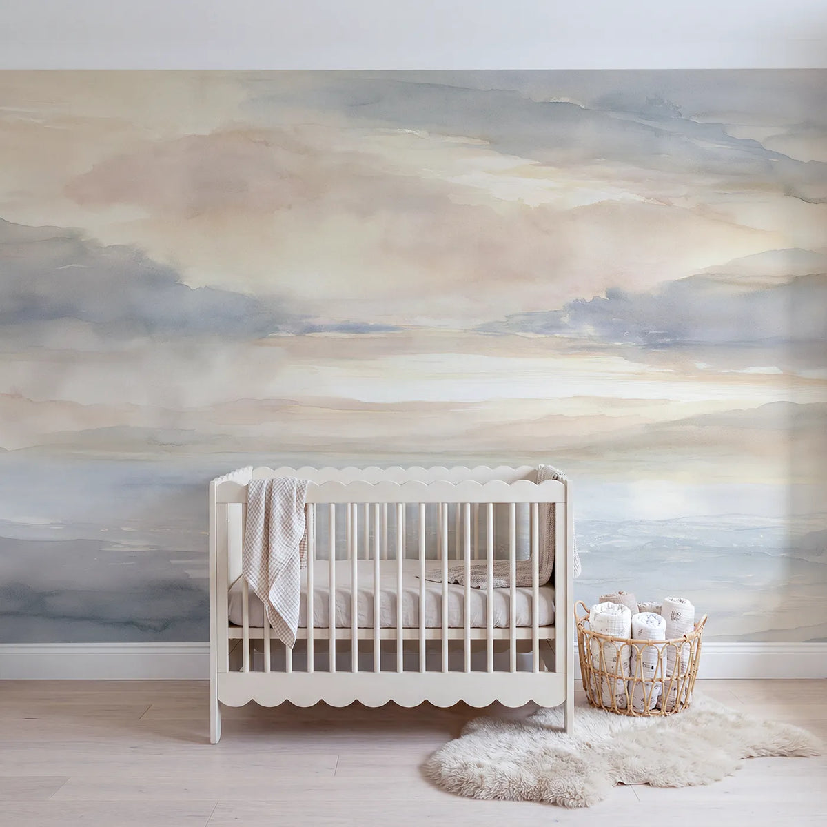 Watercolor wall mural of rain clouds gently parting by Whimsy Tots