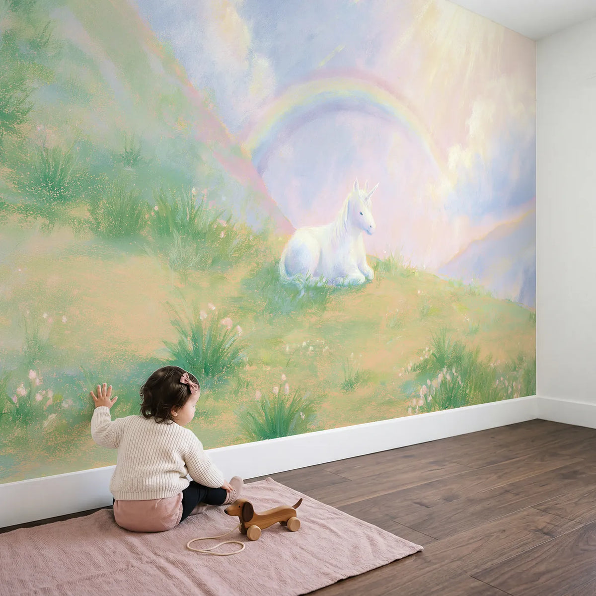 Child in nursery with Soft Unicorn Dream Wallpaper Mural by Whimsy Tots