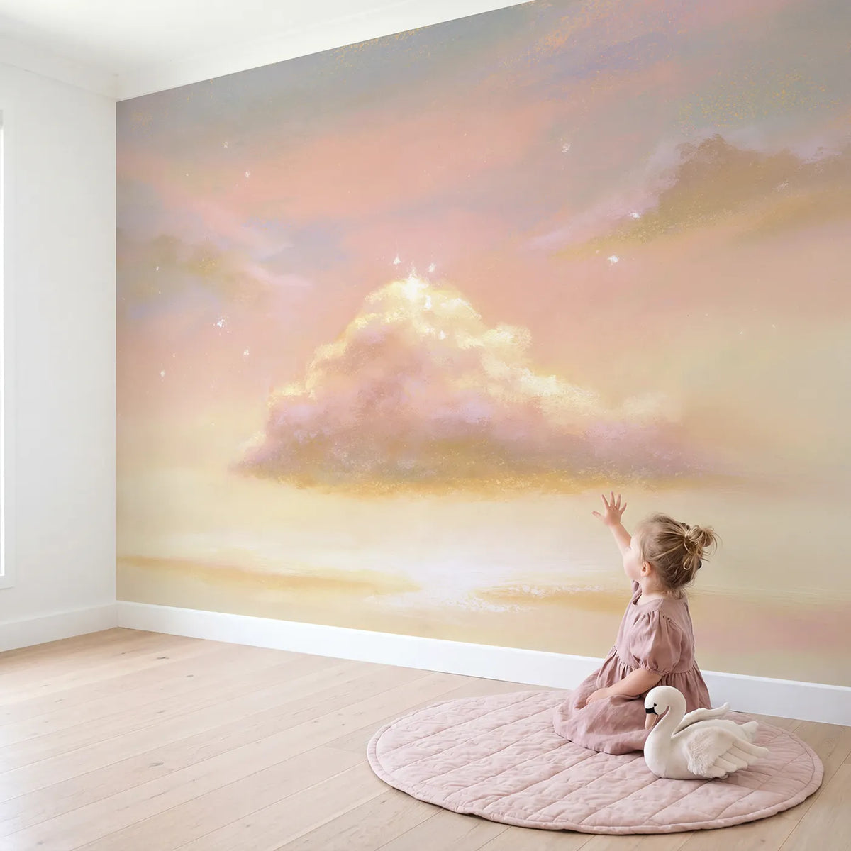Child in nursery with Magic Cloud Sparkle Wallpaper Mural by Whimsy Tots