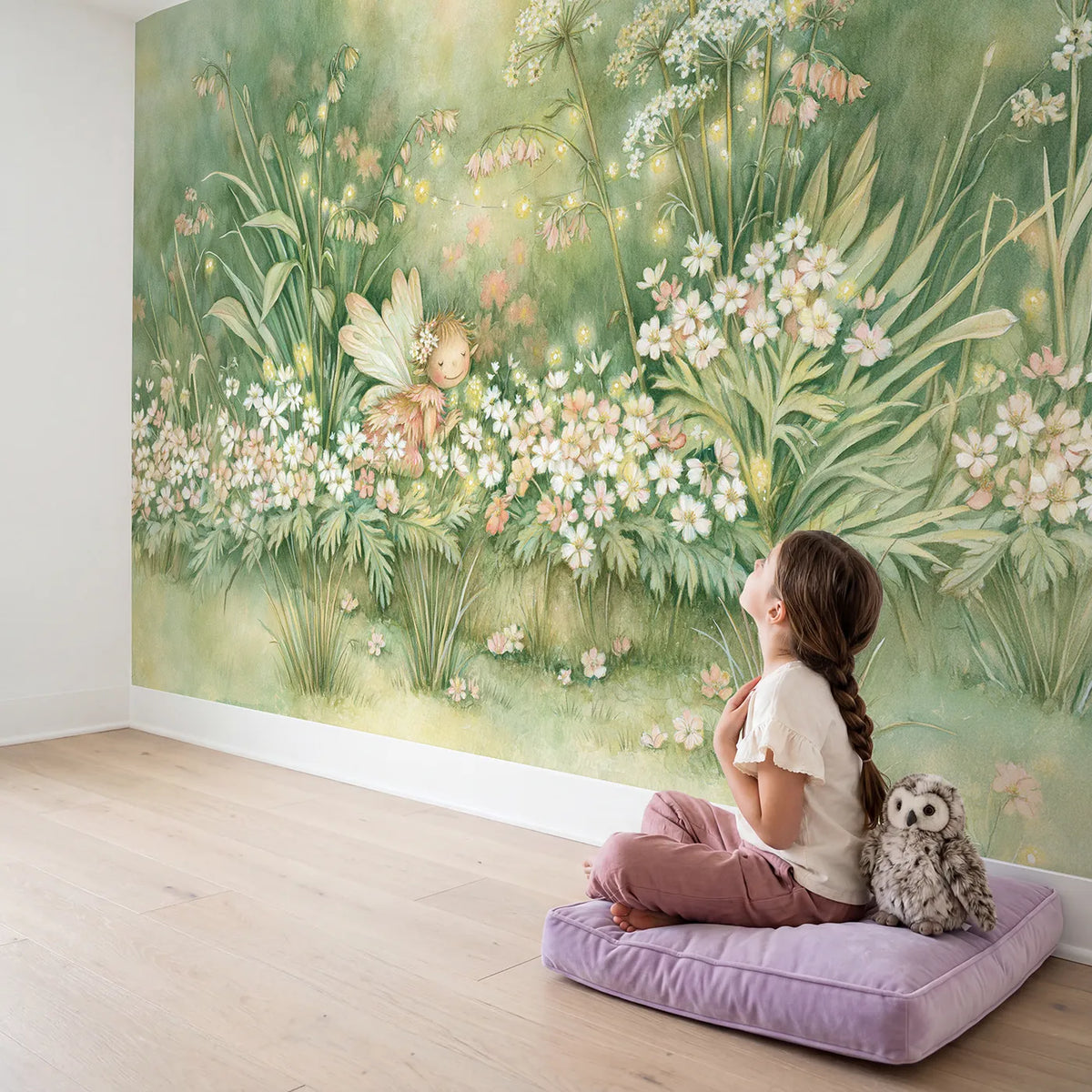 Child in nursery with Little Fairy Garden Wallpaper Mural by Whimsy Tots
