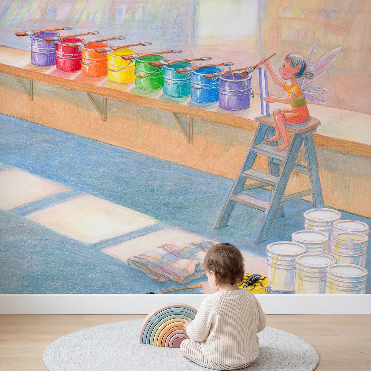 Child in nursery with The Rainbow Paint Pots Wallpaper Mural by Whimsy Tots