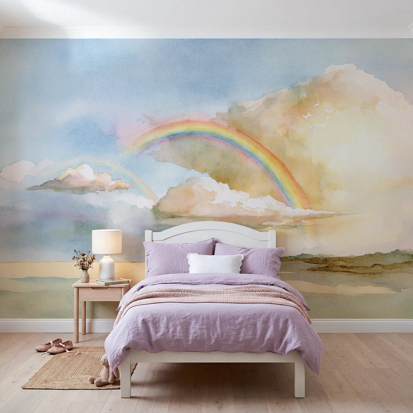 Watercolor wall mural of a studied rainbow arc by Whimsy Tots
