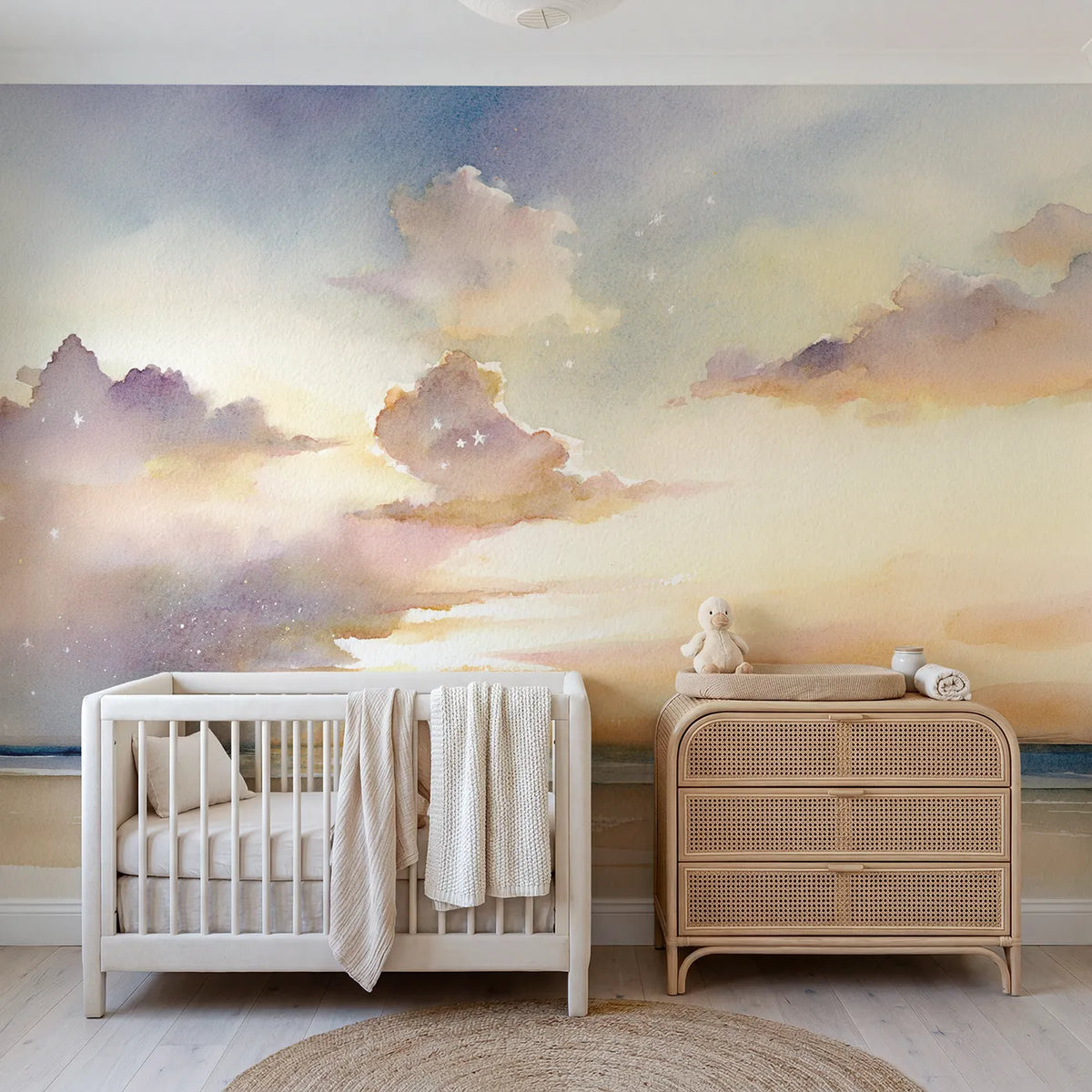 Watercolor wall mural of a soft cloud with tender stars by Whimsy Tots
