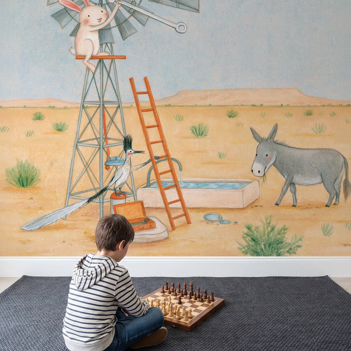 Child in nursery with Fixing the Windpump Wallpaper Mural by Whimsy Tots