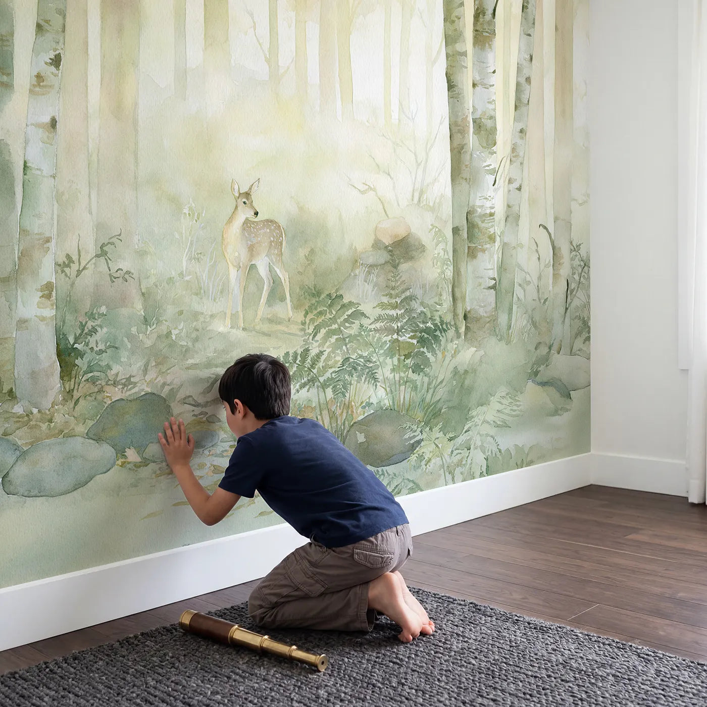 Child in nursery with Misty Morning Deer Wallpaper Mural by Whimsy Tots