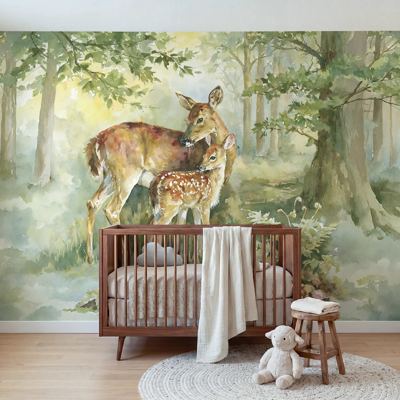 Watercolor wall mural of a doe and spotted fawn by Whimsy Tots