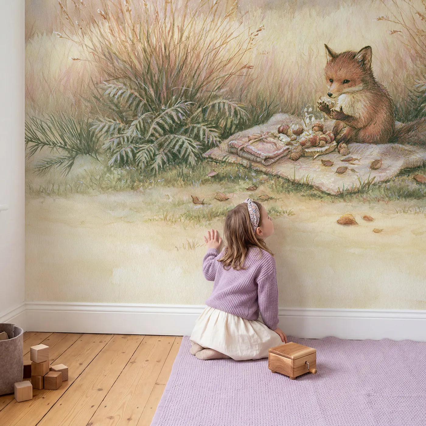 Child in nursery with Cozy Fox Picnic Wallpaper Mural by Whimsy Tots