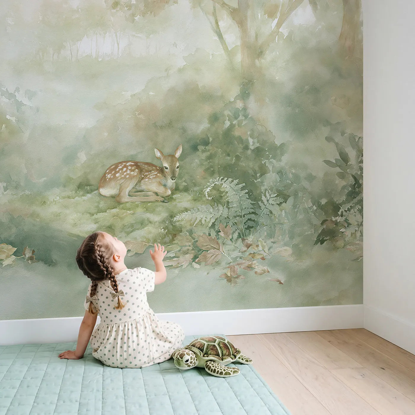 Child in nursery with Mossy Glen Fawn Wallpaper Mural by Whimsy Tots