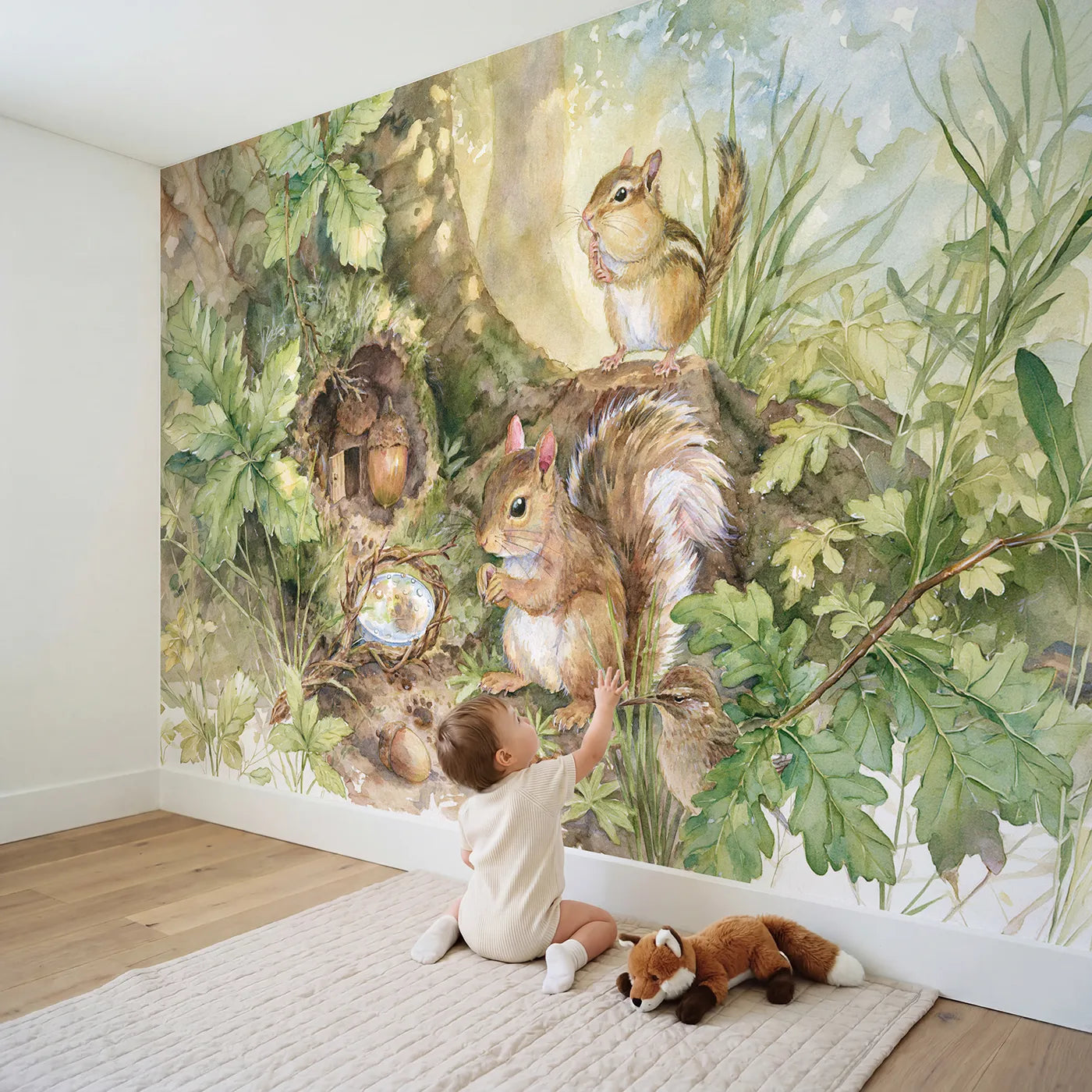 Child in nursery with The Acorn Detective Wallpaper Mural by Whimsy Tots