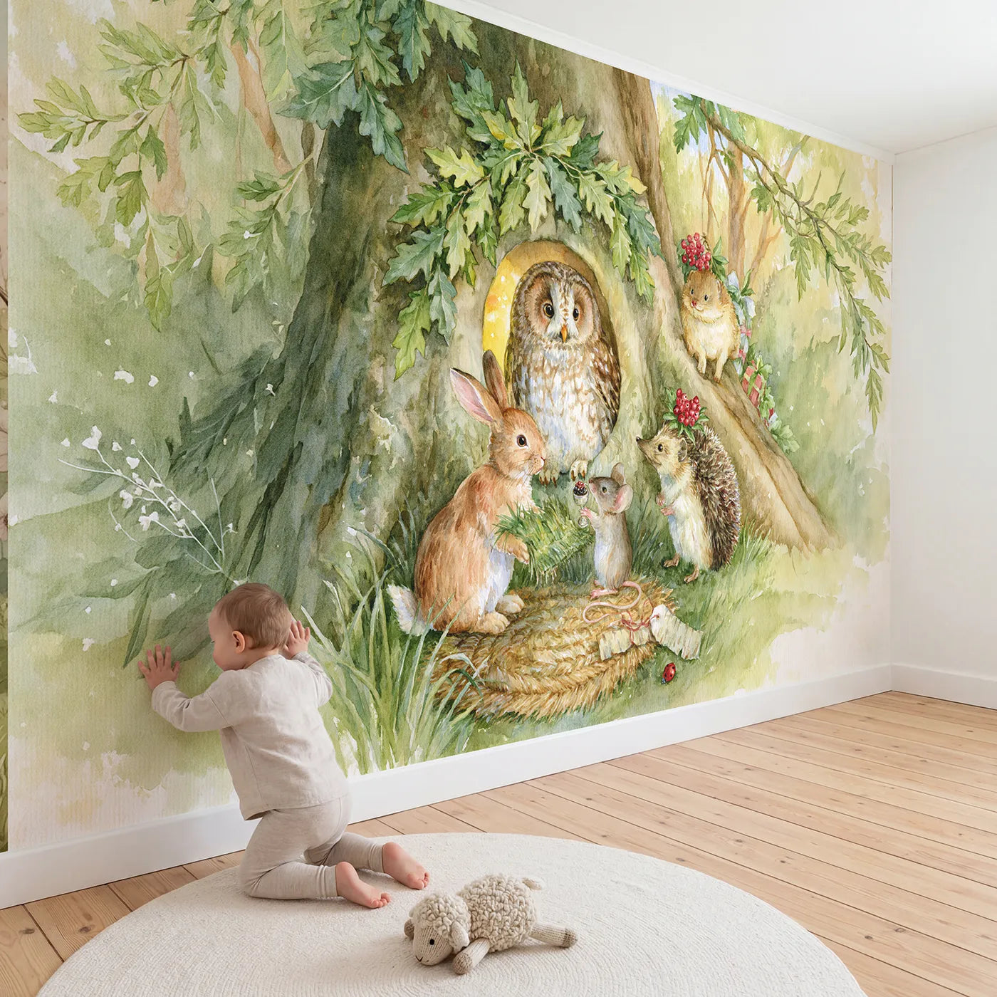 Child in nursery with Owl Hollow Housewarming Wallpaper Mural by Whimsy Tots