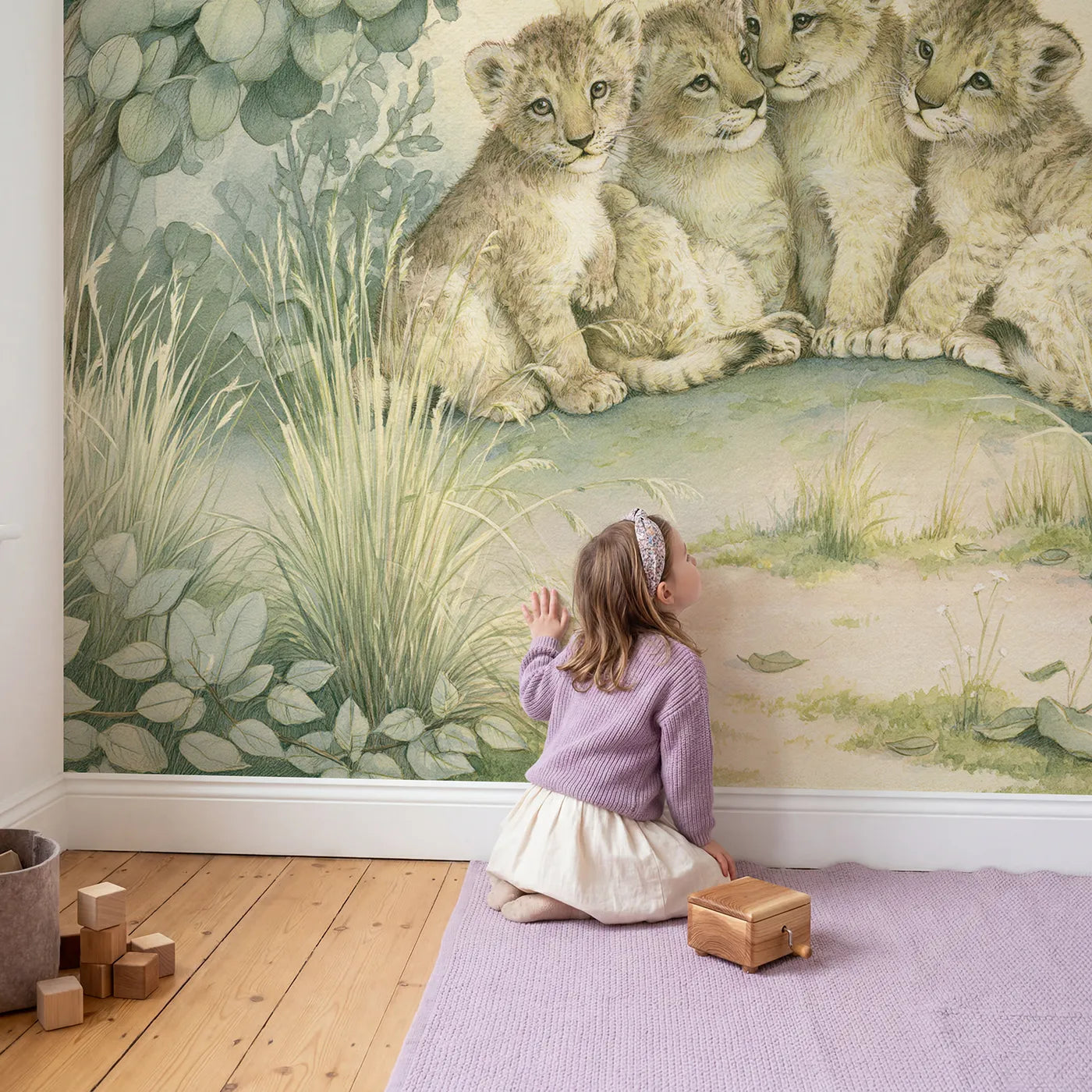 Child in nursery with Cuddle Up Cubs Wallpaper Mural by Whimsy Tots