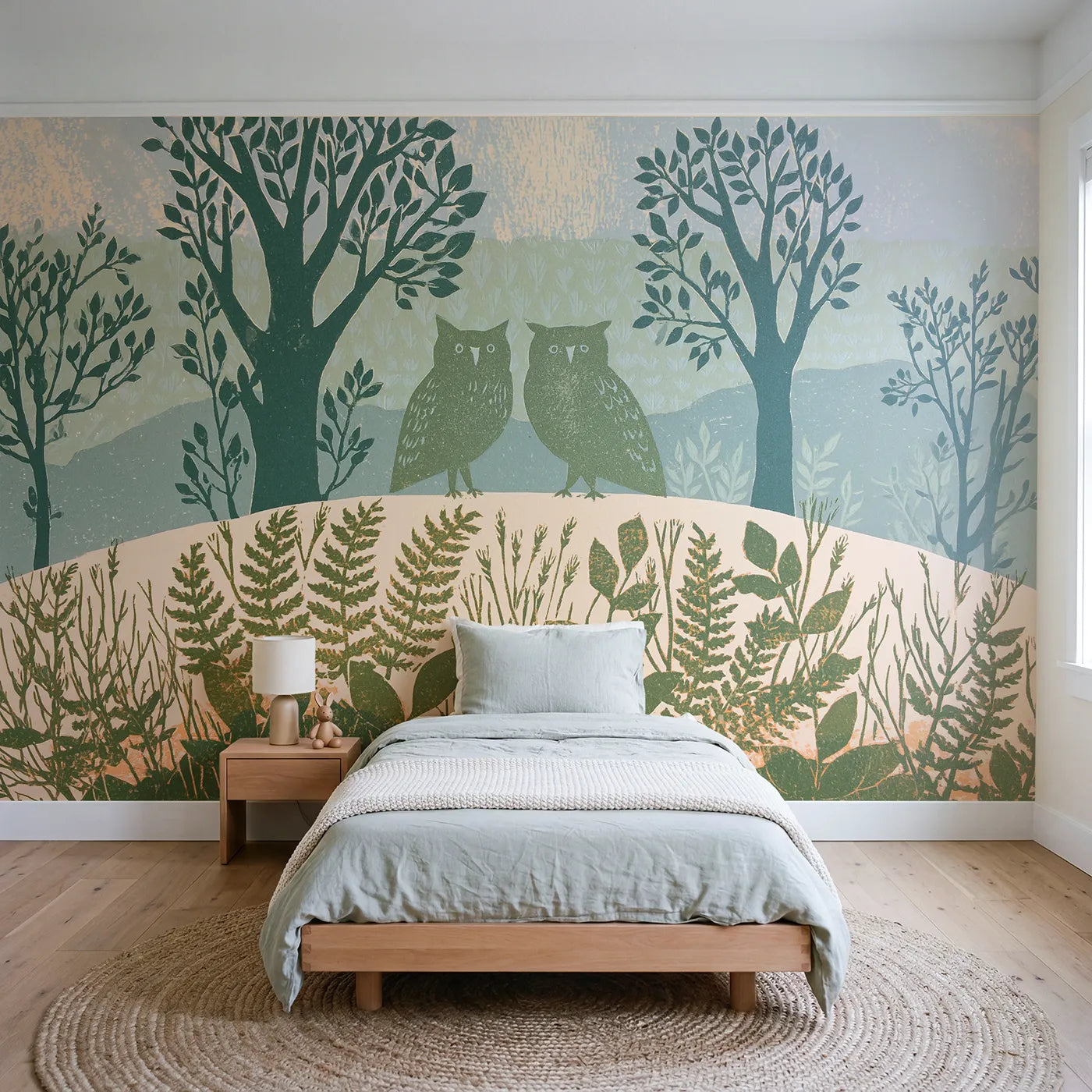 Linocut wall mural of a watchful owl pair in sage ink by Whimsy Tots