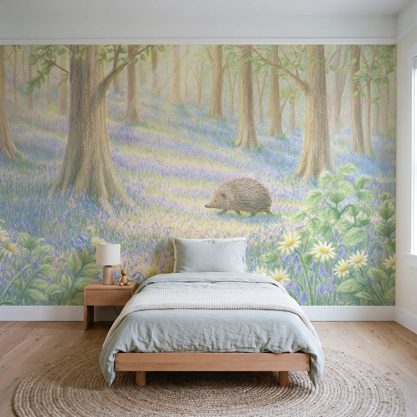 Colored-pencil wall mural of a hedgehog among bluebells by Whimsy Tots