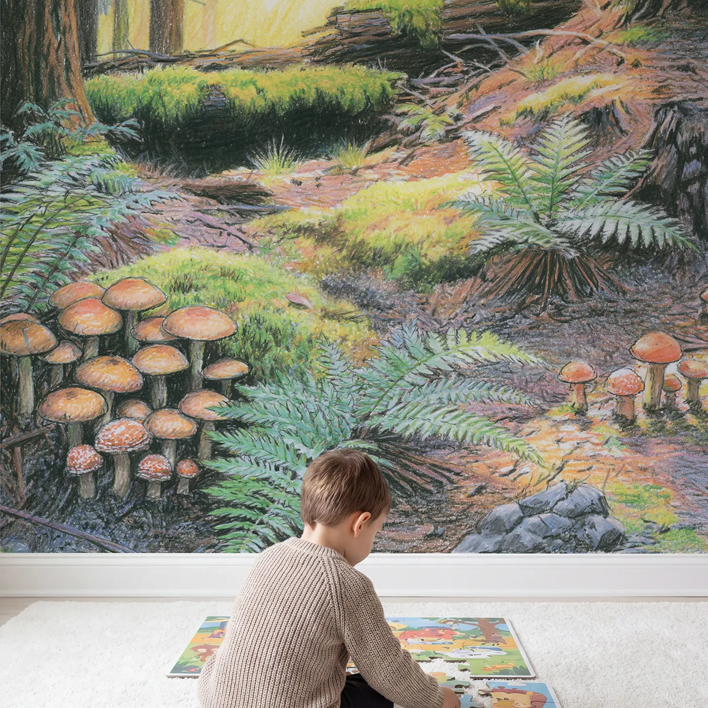 Child in nursery with Toadstool Forest Floor Wallpaper Mural by Whimsy Tots