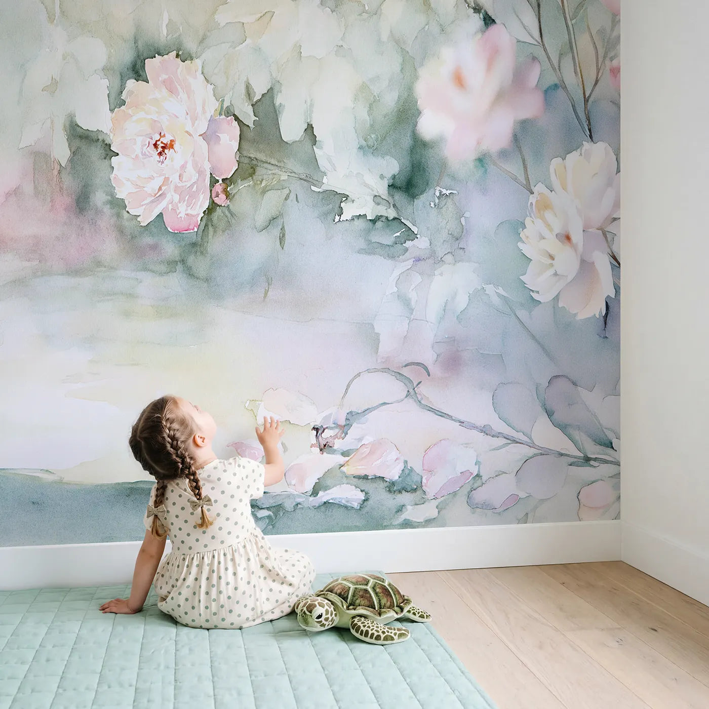 Child in nursery with Soft Peony Haze Wallpaper Mural by Whimsy Tots