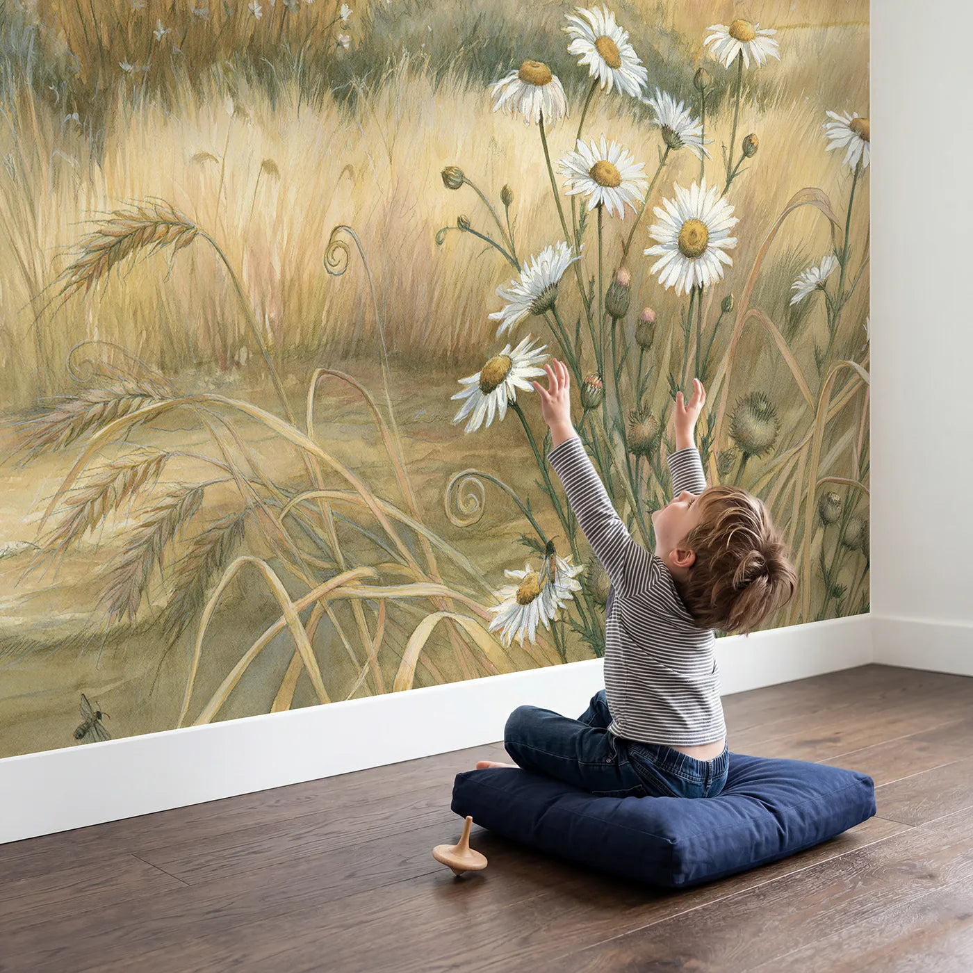 Child in nursery with Sunny Meadow Day Wallpaper Mural by Whimsy Tots