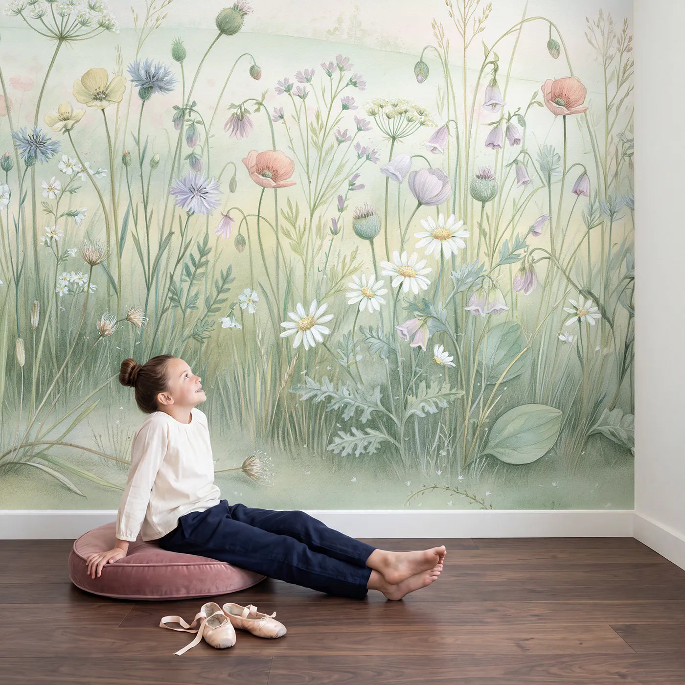 Child in nursery with Whimsical Wildflower Field Wallpaper Mural by Whimsy Tots