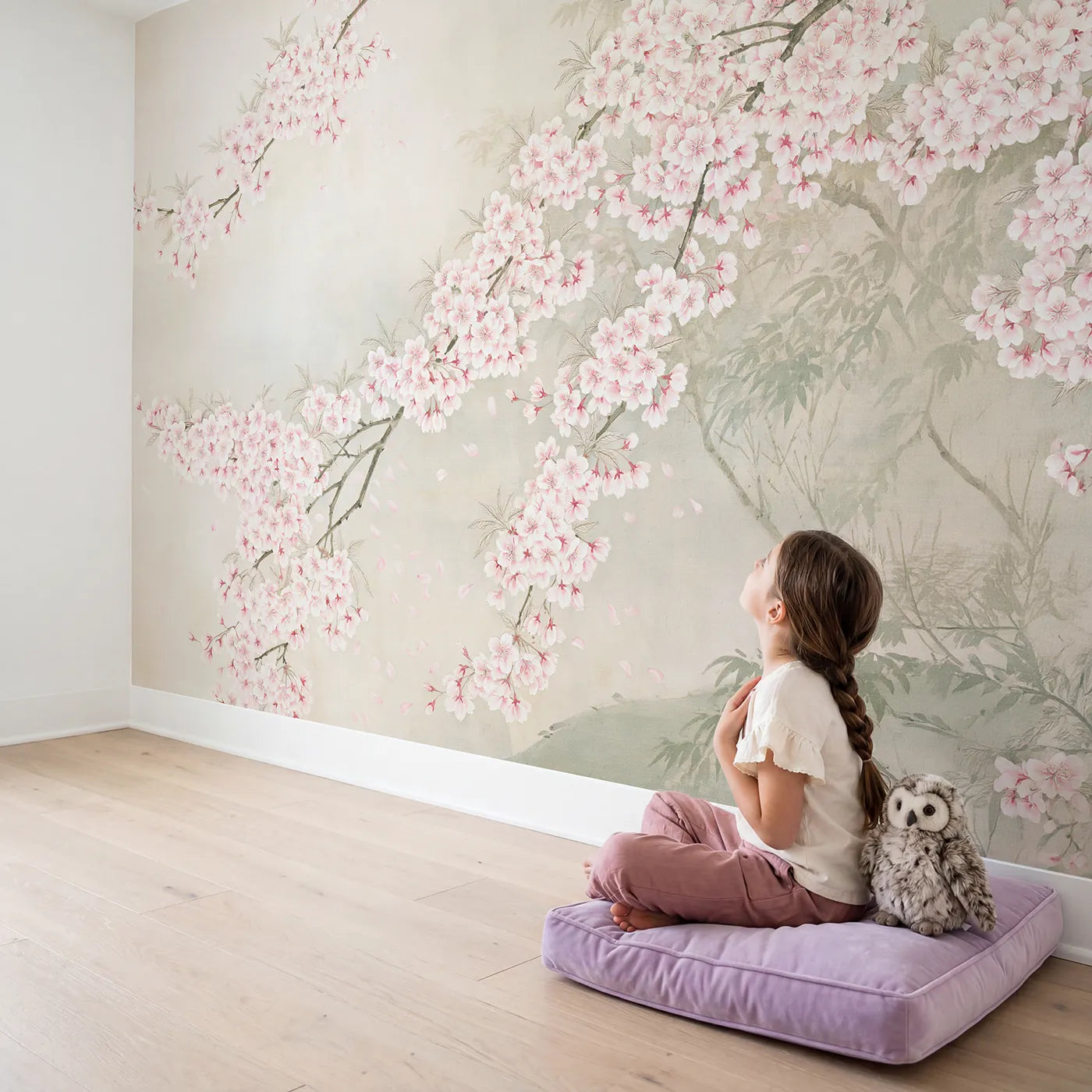Child in nursery with The Flowering Cherry Canopy Wallpaper Mural by Whimsy Tots