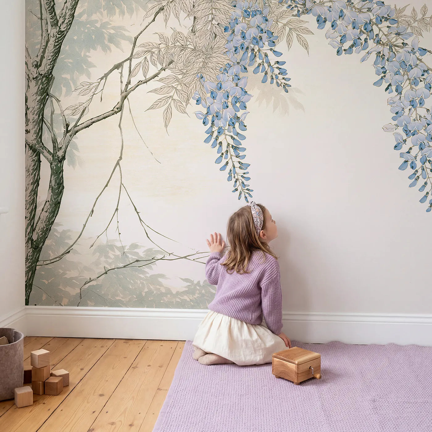 Child in nursery with Wisteria Hanging Vine Wallpaper Mural by Whimsy Tots