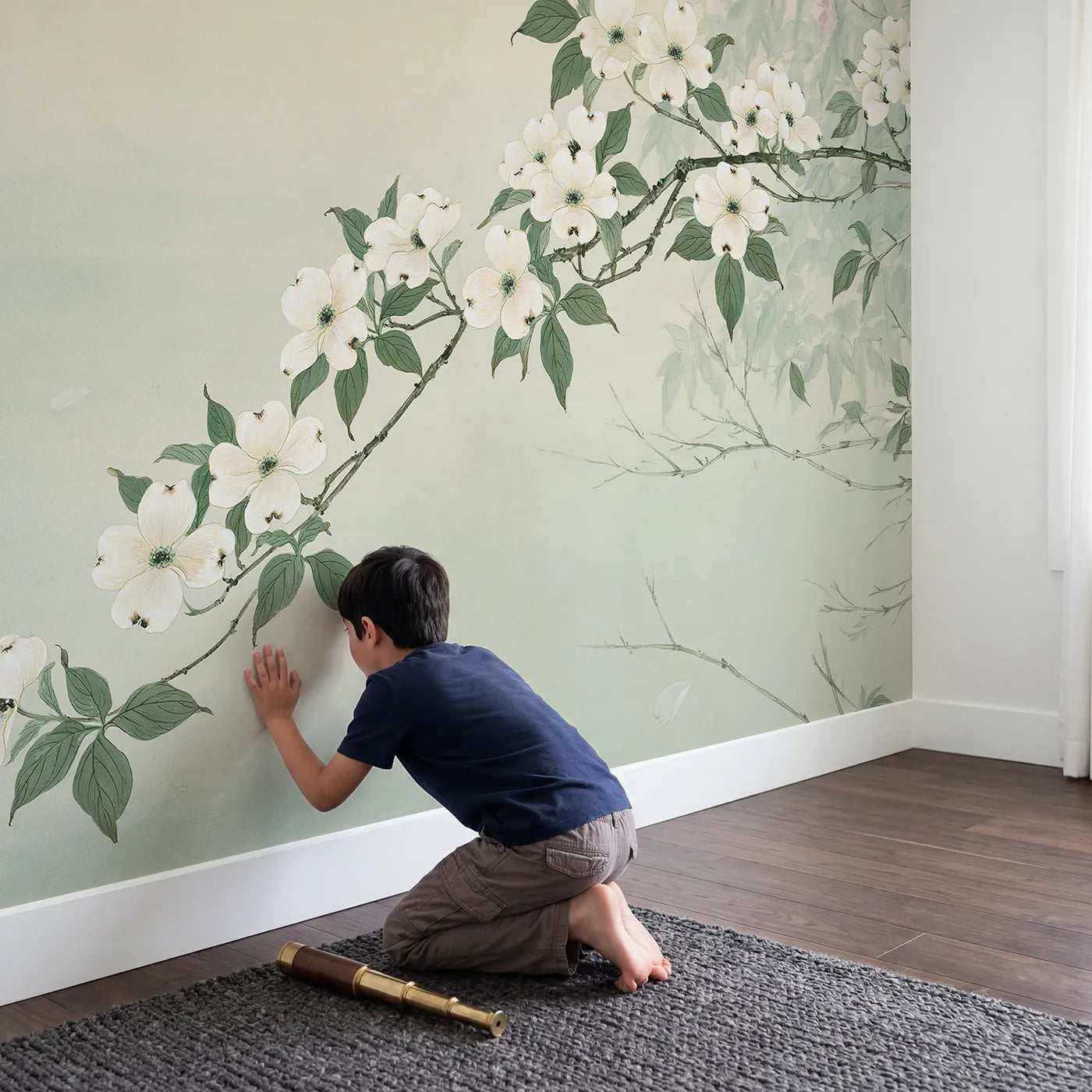 Child in nursery with Dogwood Flower Branch Wallpaper Mural by Whimsy Tots