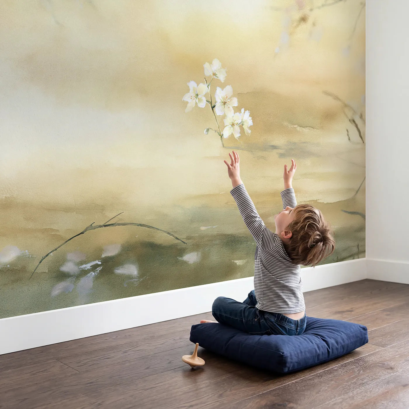 Child in nursery with Golden Blossom Glow Wallpaper Mural by Whimsy Tots