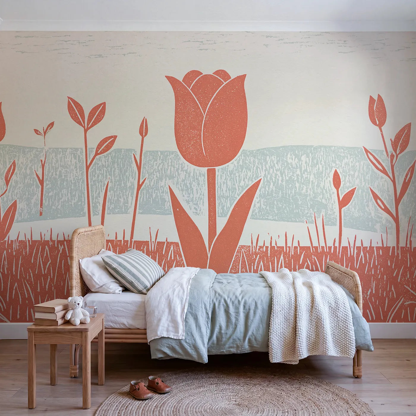 Linocut wall mural of a coral tulip stem by Whimsy Tots