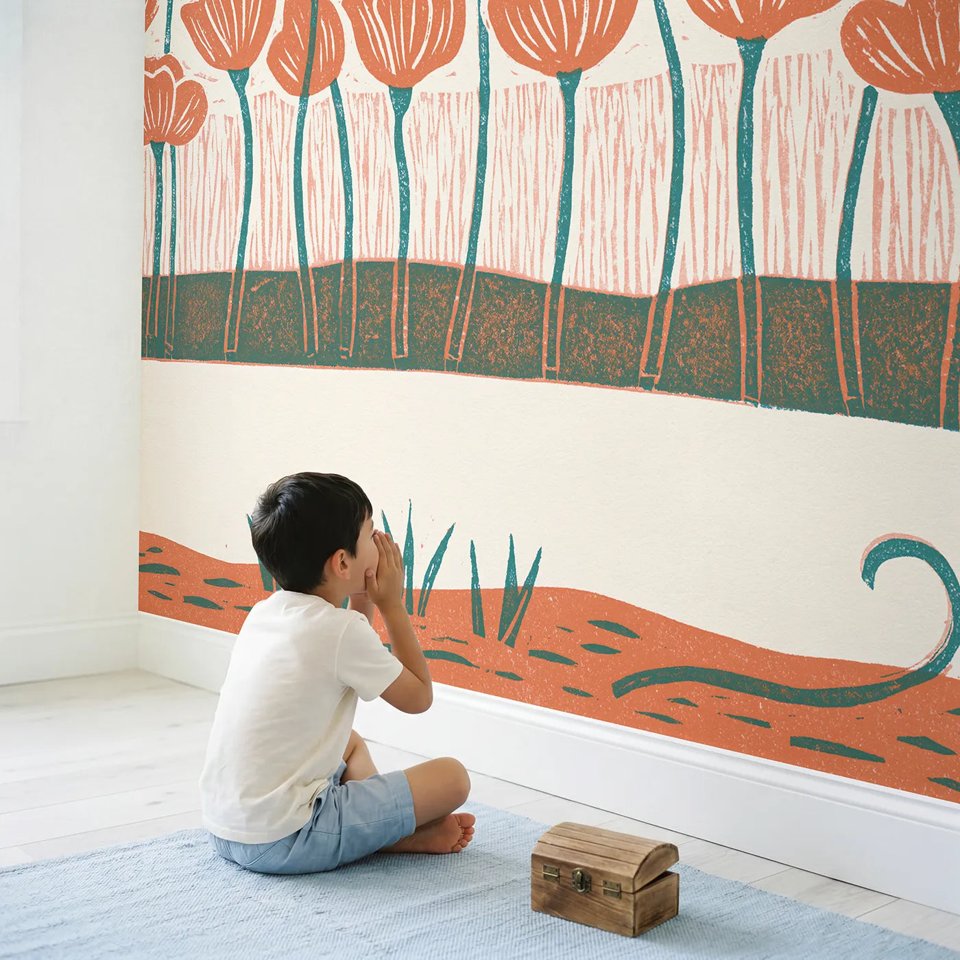 Child in nursery with Linocut Poppy Field Wallpaper Mural by Whimsy Tots