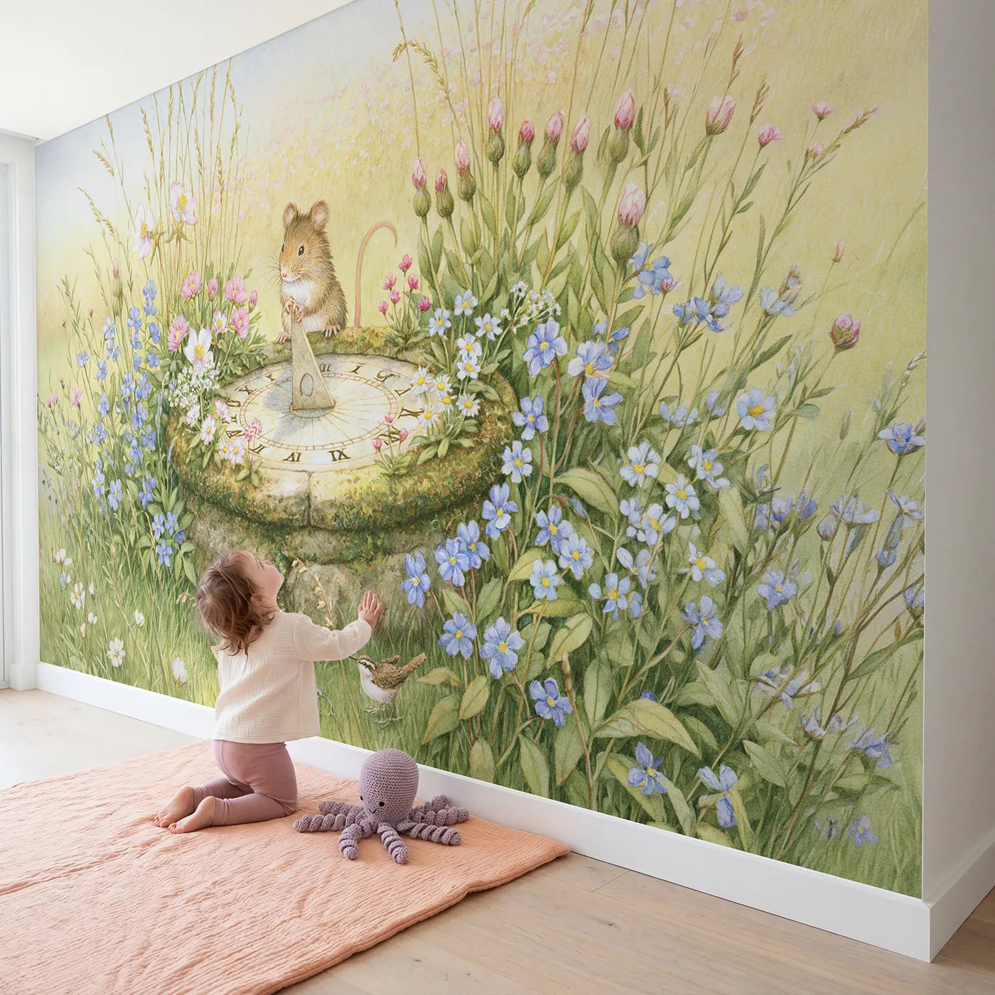 Child in nursery with The Meadow Sundial Wallpaper Mural by Whimsy Tots