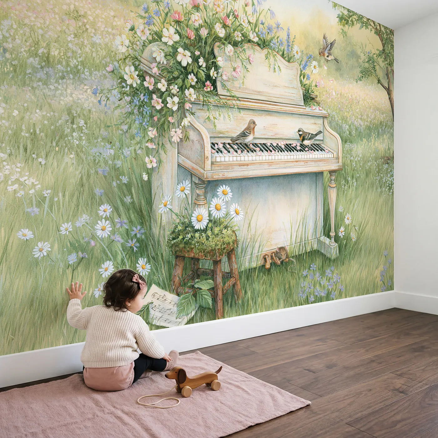 Child in nursery with The Wildflower Piano Wallpaper Mural by Whimsy Tots