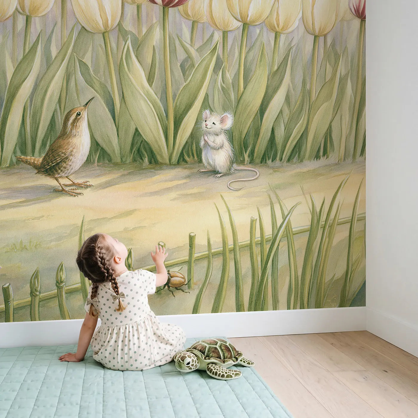 Child in nursery with The Odd Tulip Out Wallpaper Mural by Whimsy Tots