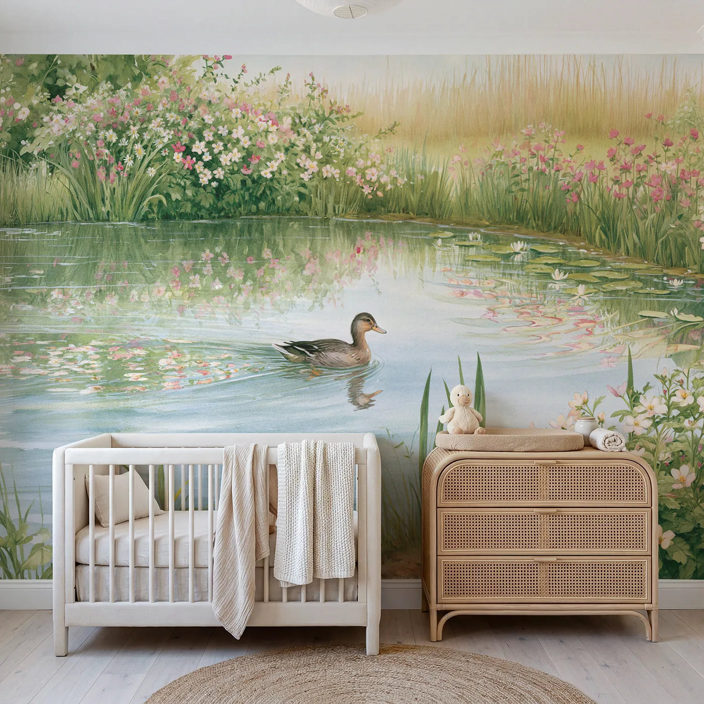 Storybook duck gliding across a mirror meadow pond, wall mural for a toddler room by Whimsy Tots