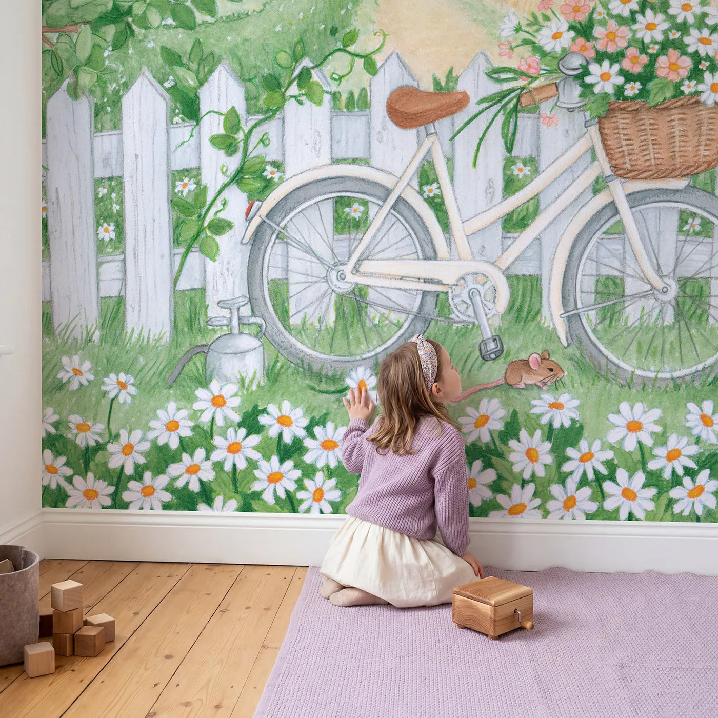 Child in nursery with The Flower Bicycle Wallpaper Mural by Whimsy Tots