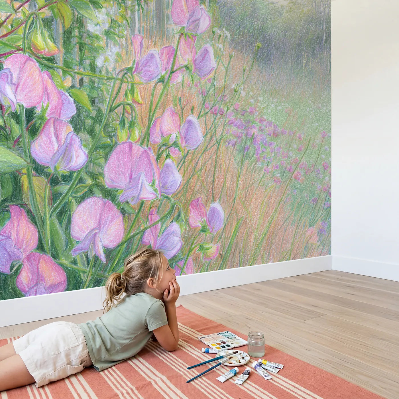 Child in nursery with Sweet Pea Trellis Wallpaper Mural by Whimsy Tots