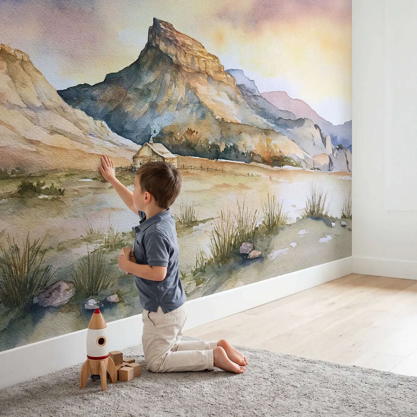 Child in nursery with Starlit Mesa Plateau Cabin Wallpaper Mural by Whimsy Tots