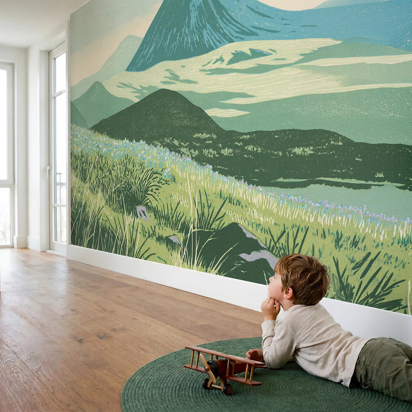 Child in nursery with Linocut Midday Volcano Hill Wallpaper Mural by Whimsy Tots