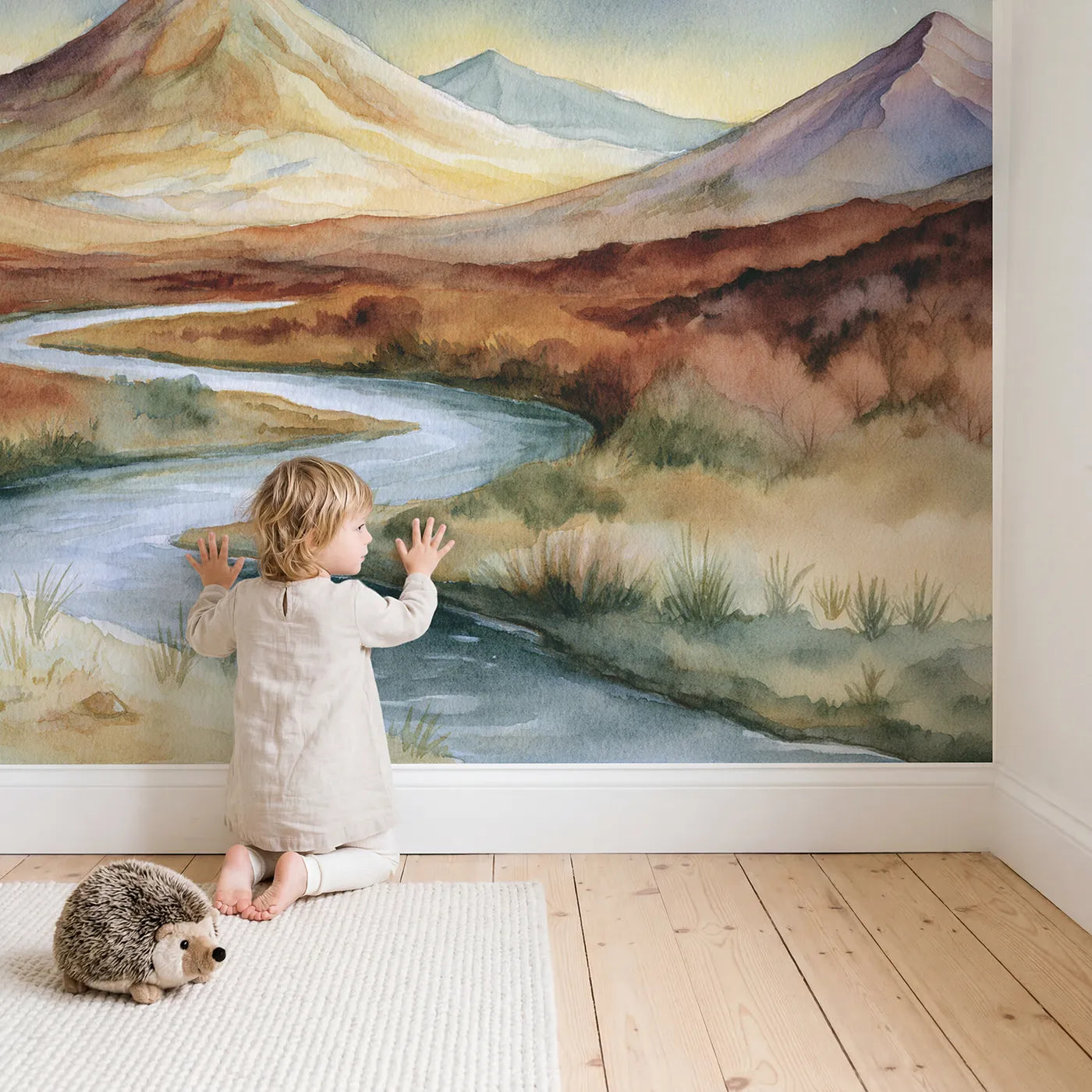Child in nursery with Starlit Volcano Hill Wallpaper Mural by Whimsy Tots